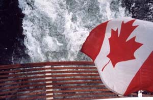 Canadian Flag, looking down over swim platform on wake turbulence